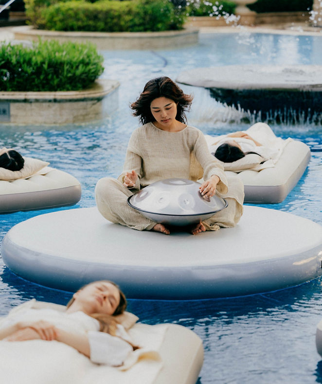 Two ladies are happy about the rise of status level of their Brilliant by Langham membership.