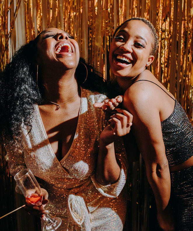 Two ladies are happy about the rise of status level of their Brilliant by Langham membership.