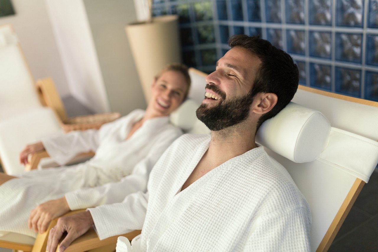 Couple enjoying wellness spa resort treatments; Shutterstock ID 717134095; purchase_order: -; job: -; client: -; other: -